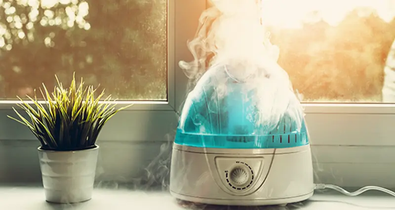 A large house featuring a spacious front porch, showcasing its inviting architectural design.