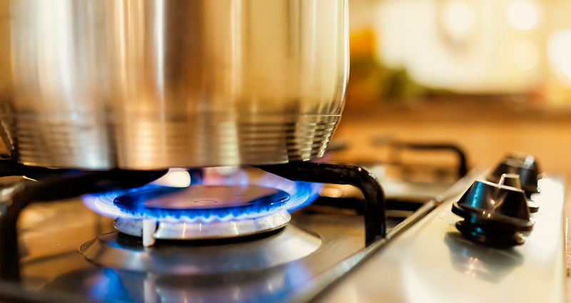 close up of pot on natural gas burner