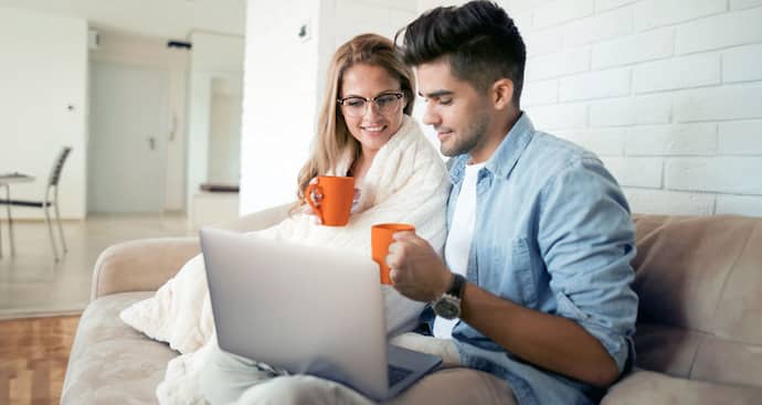 Couple looking at laptop