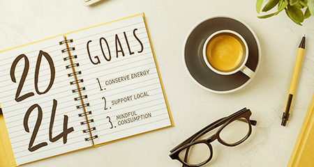 Notebook open with 2024 Goals listed