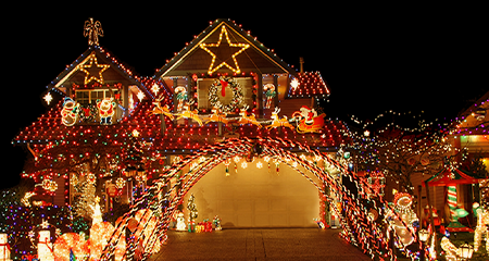 House exterior covered in Christmas lights