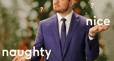 Michael Buble shrugging with naughty and nice words