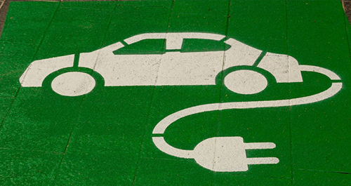 Image of electric vehicle painted on pavement