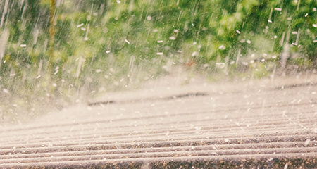 Image of hail bouncing off of roof