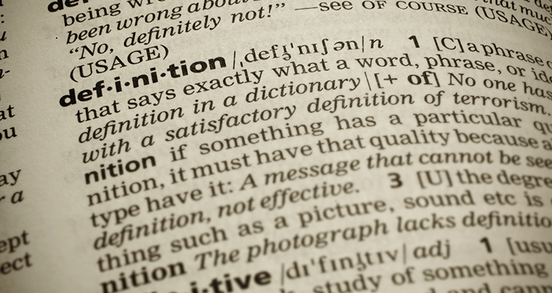 Close up of dictionary of the word definition