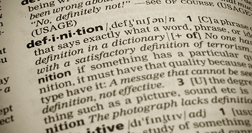 Close up of dictionary of the word definition
