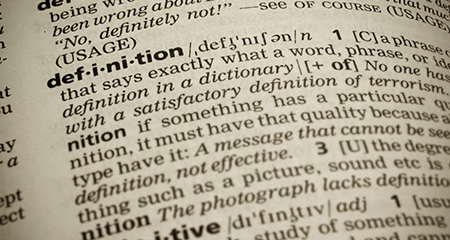 Close up of dictionary of the word definition